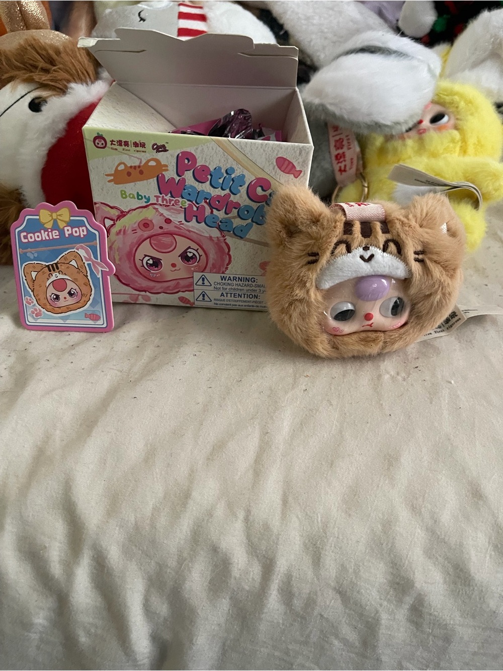 Baby Three-petit cat wardrobe Cookie head plush